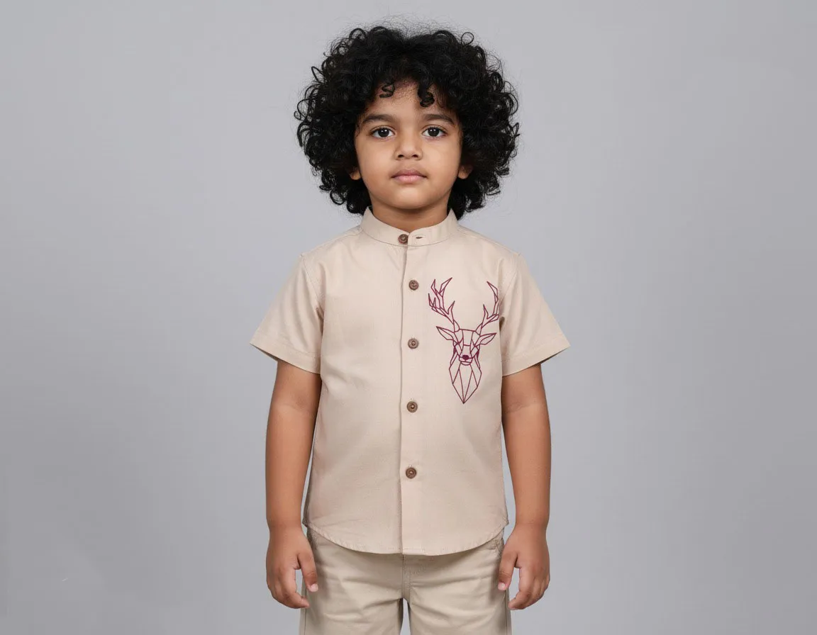 boy in cream shirt
